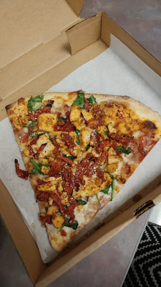 Create Your Own Pizza by the Slice Chicken Sundried Tomato and Spinach