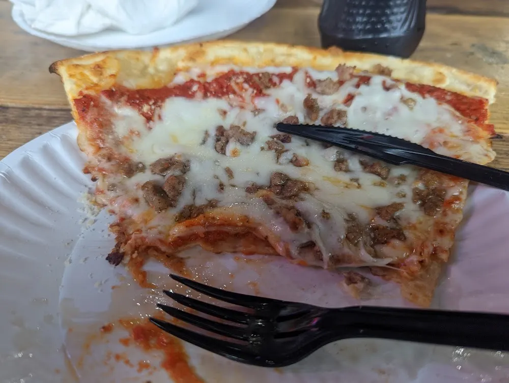 Slice with Sausage and Extra Cheese